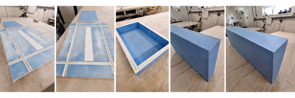 Baffle boxes at various stages of construction in a workshop