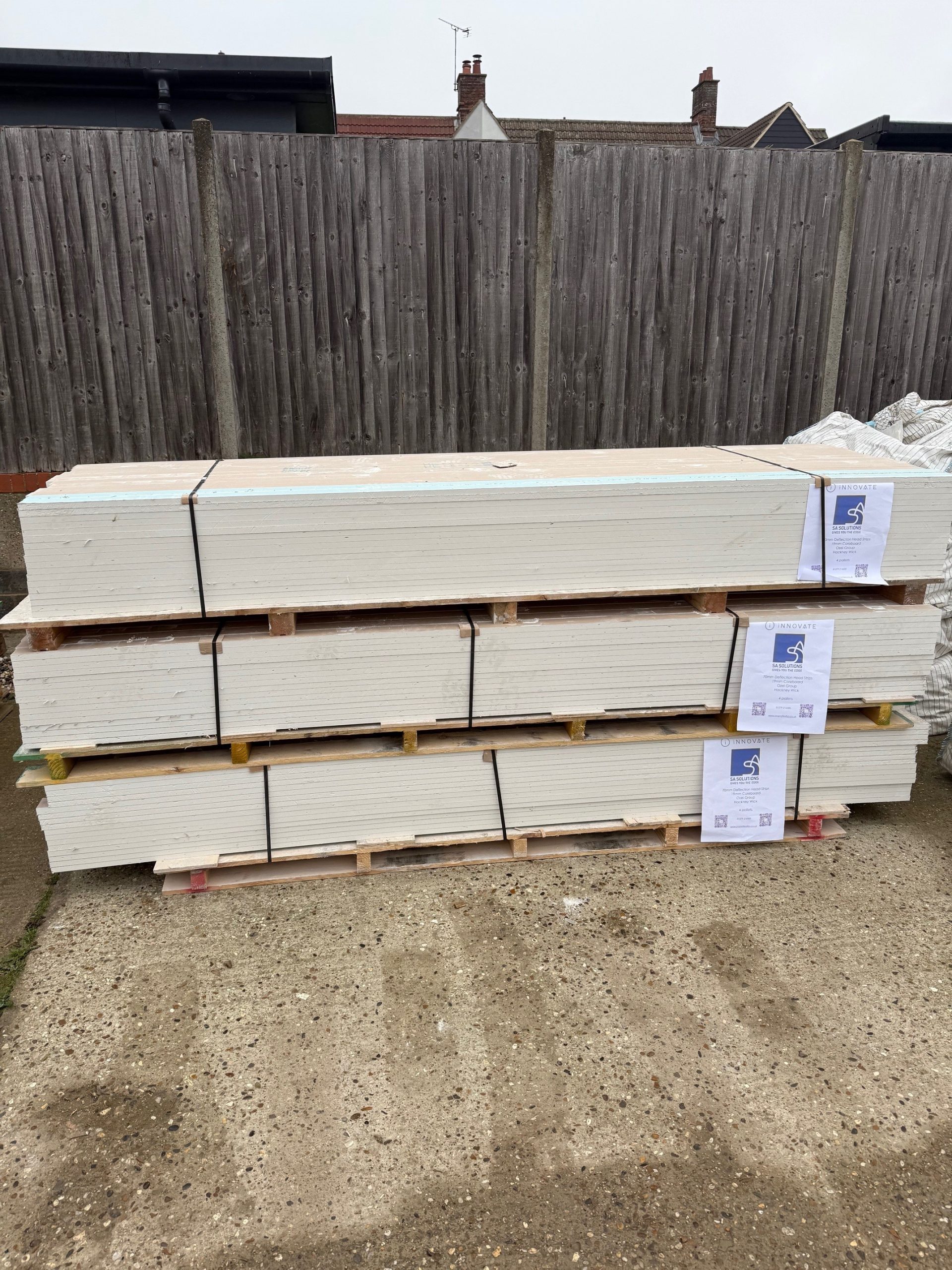 Cut deflection head strips and Coreboard banded and labelled on pallets, ready for delivery from Innovate at SA